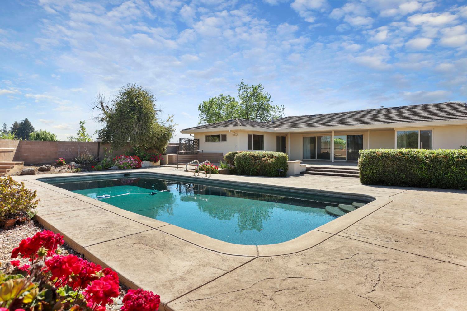2465 Vernalis Road Tracy, CA 95304 - Photo 29 of 55 a view of outdoor space yard swimming pool and furniture