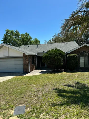 a house view with a garden space