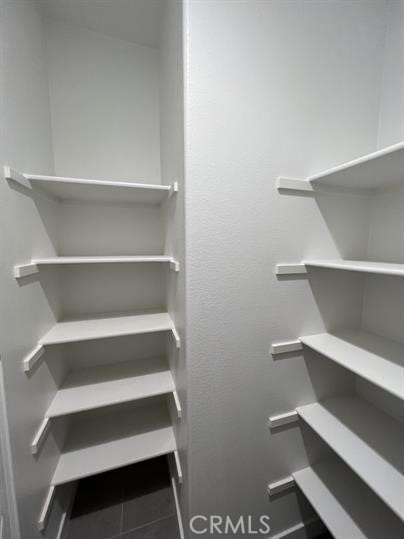 24800 Cimarron Circle Menifee, CA 92584 - Photo 12 of 29 a view of room with rack on the wall