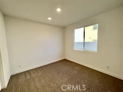 24800 Cimarron Circle Menifee, CA 92584 - Photo 16 of 29 an empty room with a window