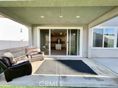 24800 Cimarron Circle Menifee, CA 92584 - Photo 21 of 29 a living room with furniture and large windows