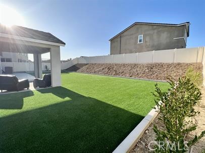 24800 Cimarron Circle Menifee, CA 92584 - Photo 22 of 29 a front view of a house with a yard