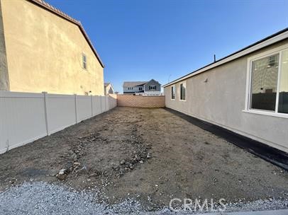 24800 Cimarron Circle Menifee, CA 92584 - Photo 28 of 29 a view of a big room with wooden fence