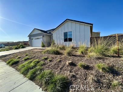 24800 Cimarron Circle Menifee, CA 92584 - Photo 3 of 29 a view of a house with a yard