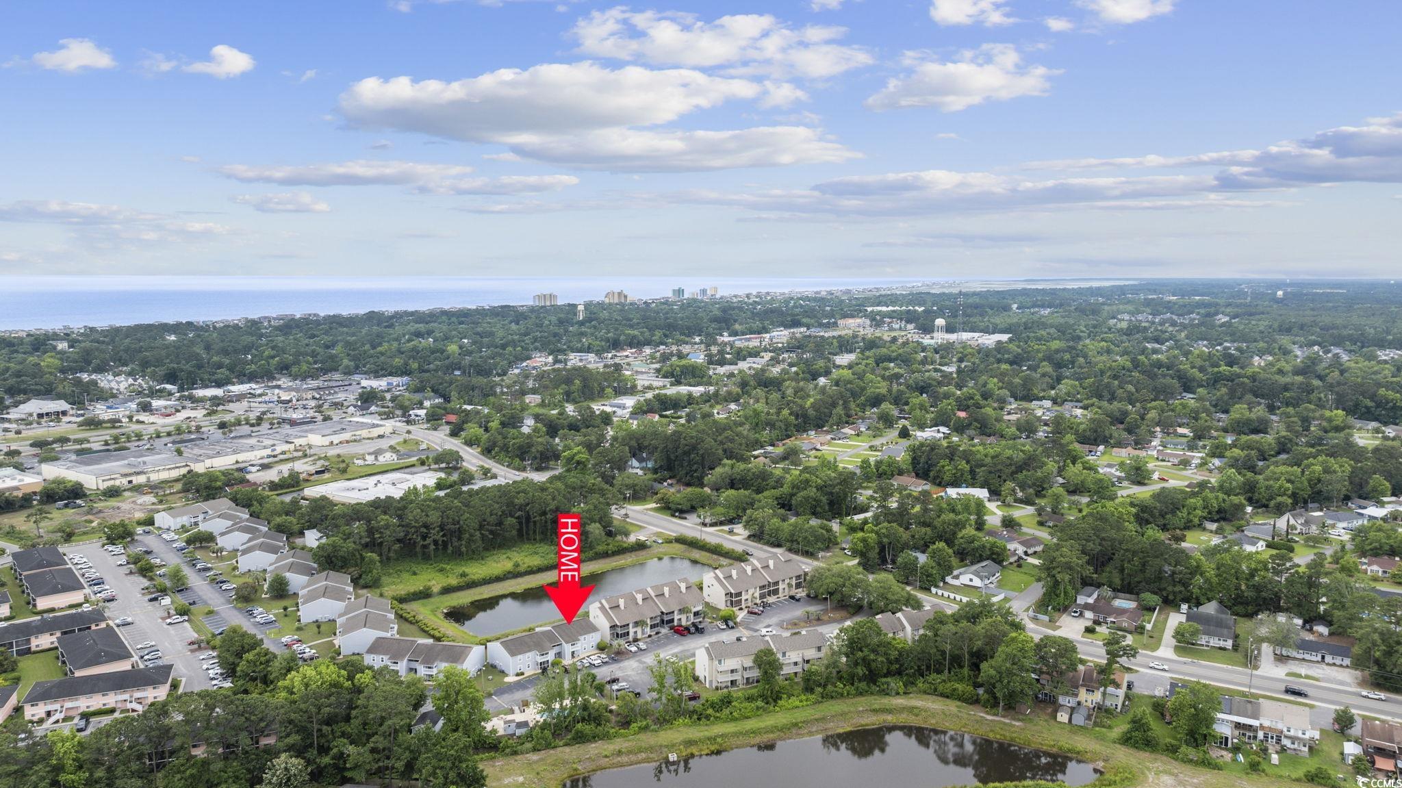 1356 Glenns Bay Road, Unit E 204 Surfside Beach, SC 29575 - Photo 23 of 27 Aerial view with a water view