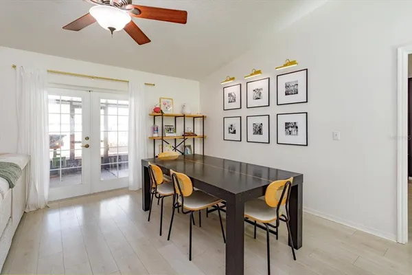a view of a livingroom with furniture and workspace