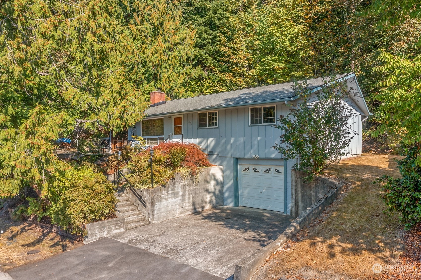 2725 Callow Road Lake Stevens, WA 98258 - Photo 1 of 37 a view of a house with a tree in front of it