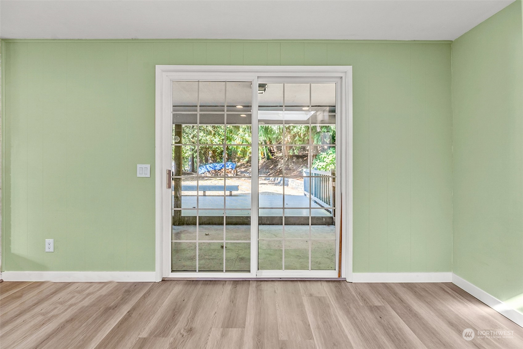 2725 Callow Road Lake Stevens, WA 98258 - Photo 16 of 37 a view of an empty room with wooden floor and a window