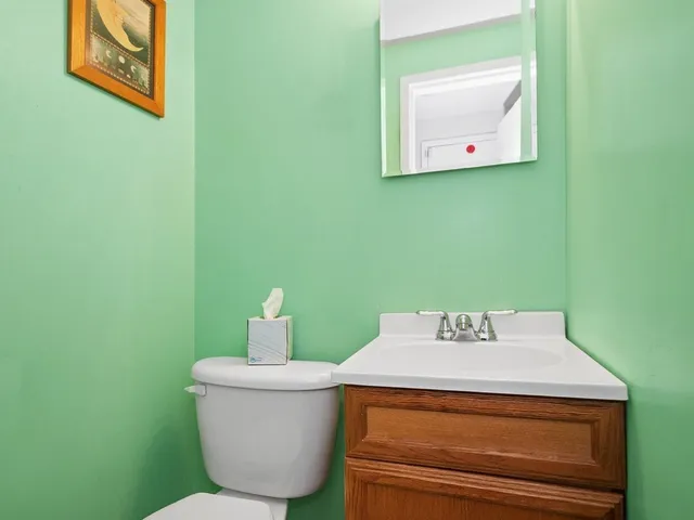 a bathroom with a toilet and sink