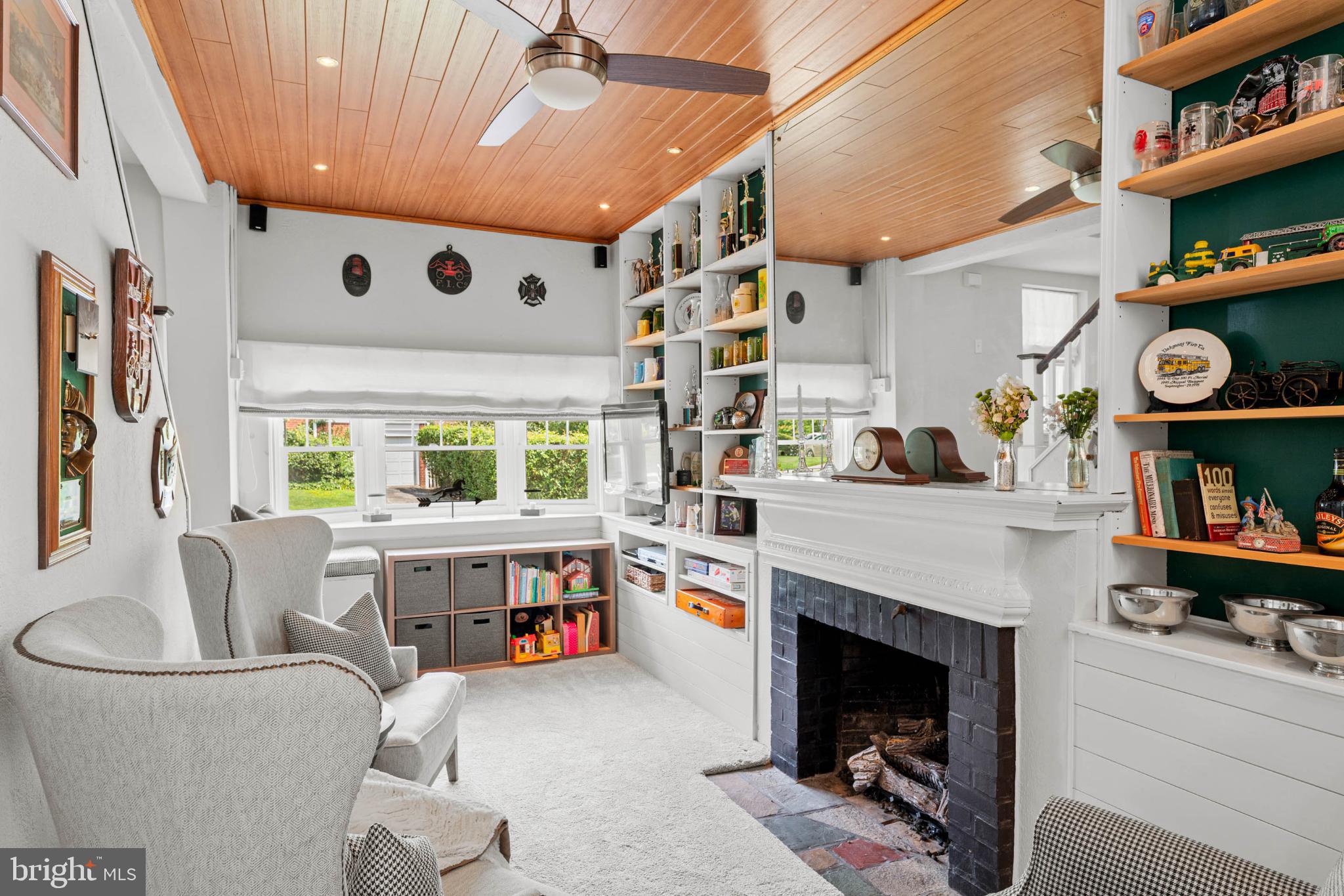 529 Covington Road Havertown, PA 19083 - Photo 16 of 34 a living room with furniture and a fireplace