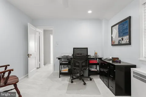 a view of a workspace with furniture