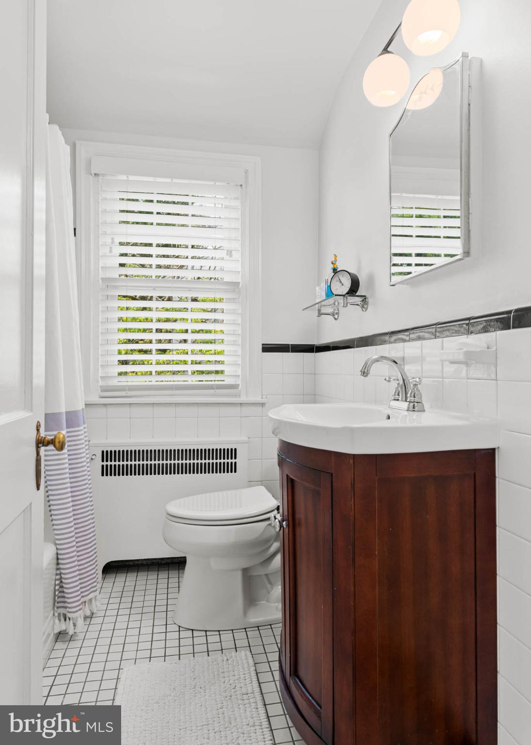 529 Covington Road Havertown, PA 19083 - Photo 24 of 34 a bathroom with a sink a toilet and a window