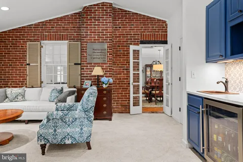 a large living room with furniture