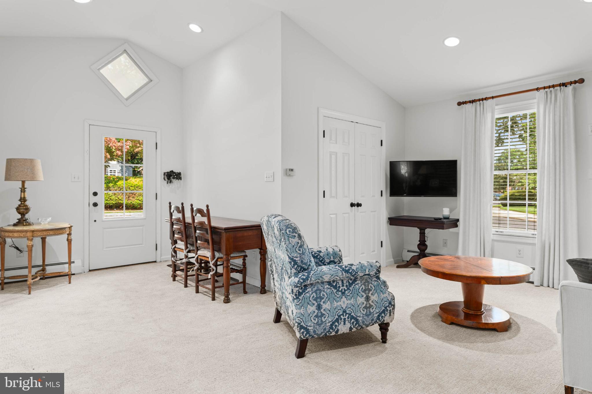 529 Covington Road Havertown, PA 19083 - Photo 26 of 34 a living room with furniture a flat screen tv and a window
