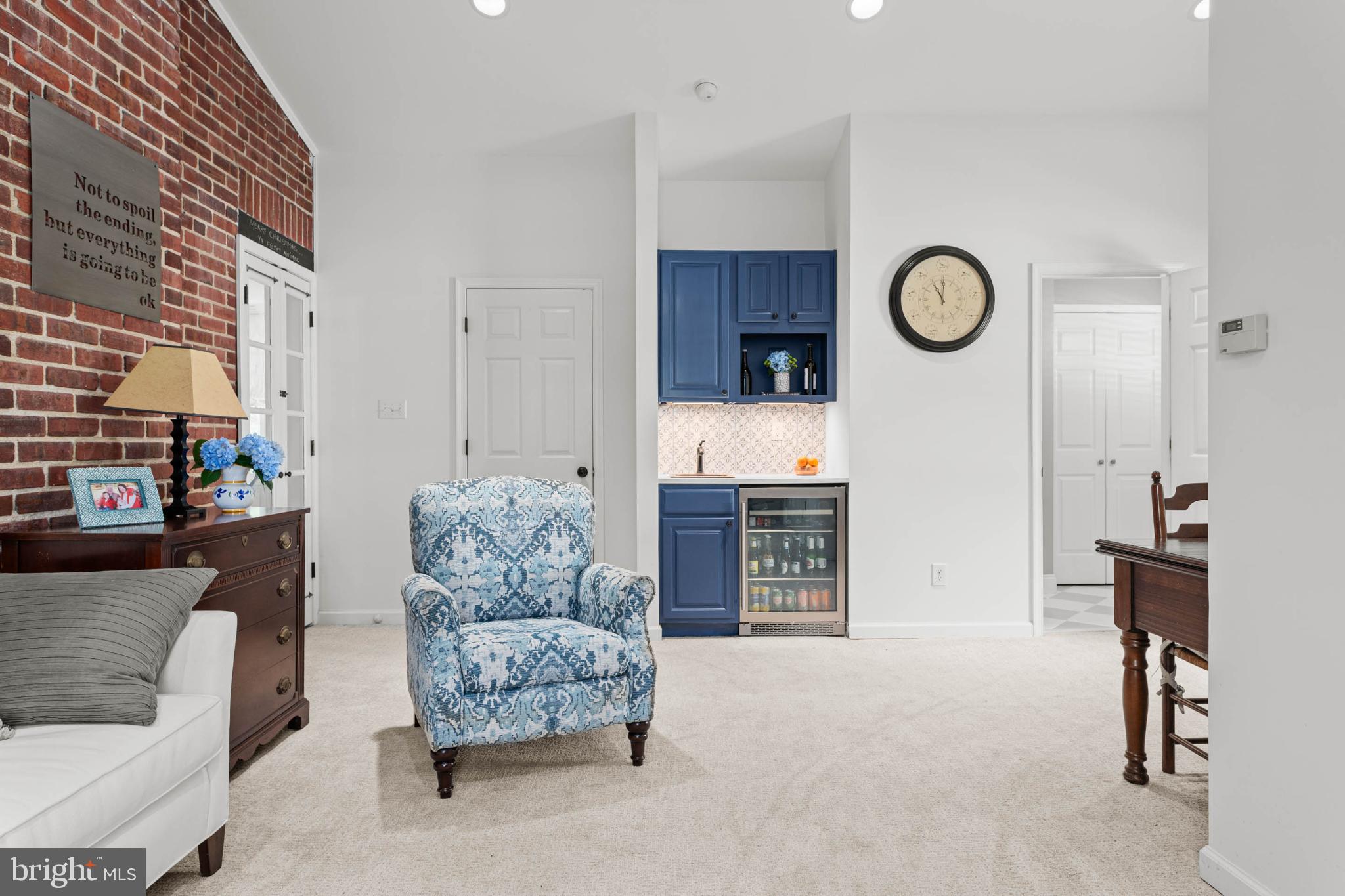 529 Covington Road Havertown, PA 19083 - Photo 27 of 34 a living room with furniture and a fireplace