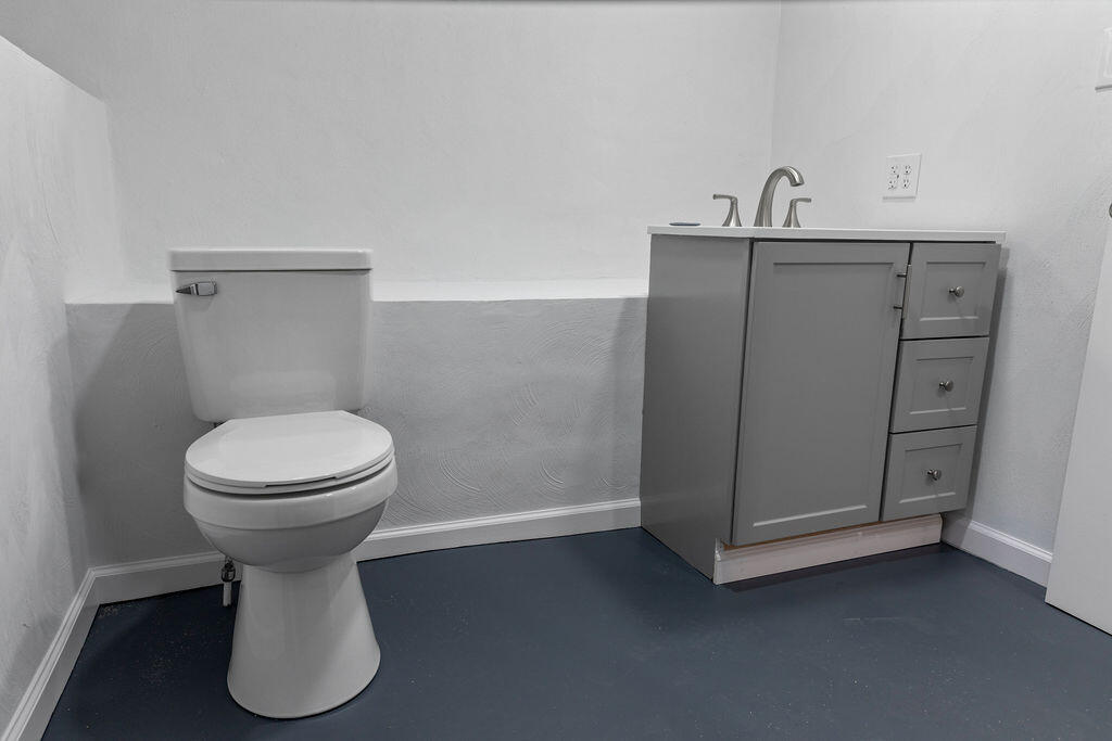2883 Timber Ridge Buchanan, VA 24066 - Photo 19 of 39 a bathroom with a toilet and a sink