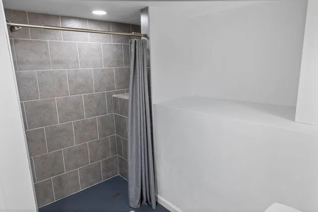 a view of room with white walls