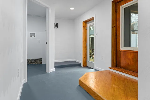 a view of entryway with wooden floor