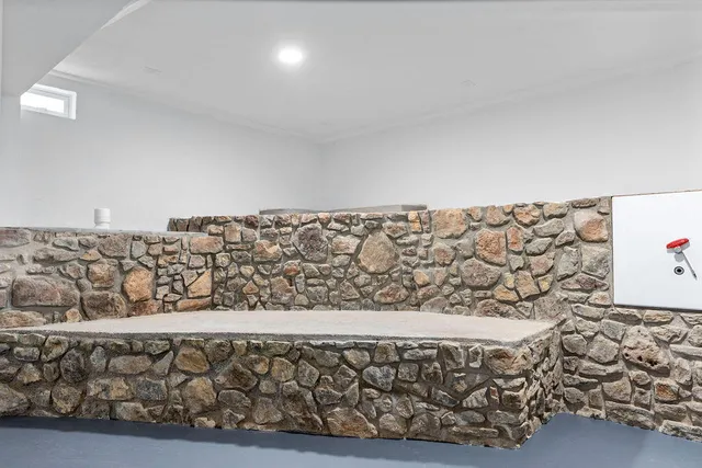 a view of empty room with windows