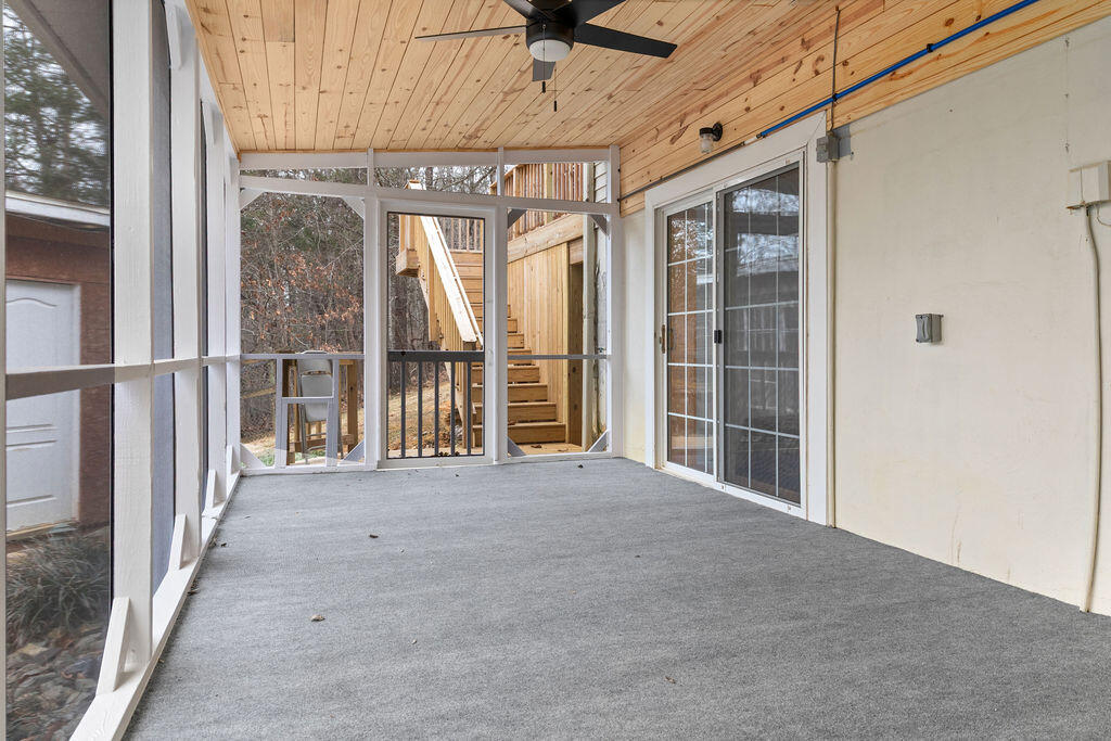 2883 Timber Ridge Buchanan, VA 24066 - Photo 28 of 39 a view of a porch with wooden floor and a table