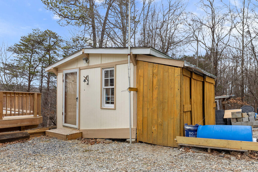 2883 Timber Ridge Buchanan, VA 24066 - Photo 32 of 39 a front view of a house with a yard