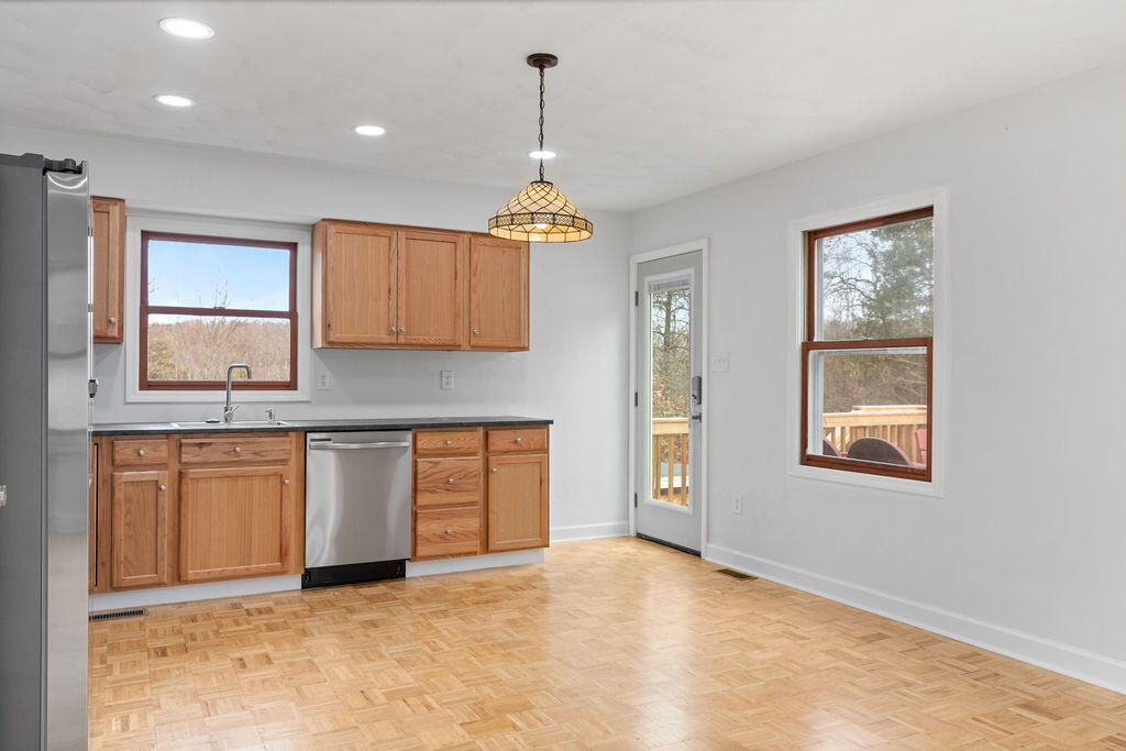 2883 Timber Ridge Buchanan, VA 24066 - Photo 4 of 39 a view of an empty room with window and cabinet