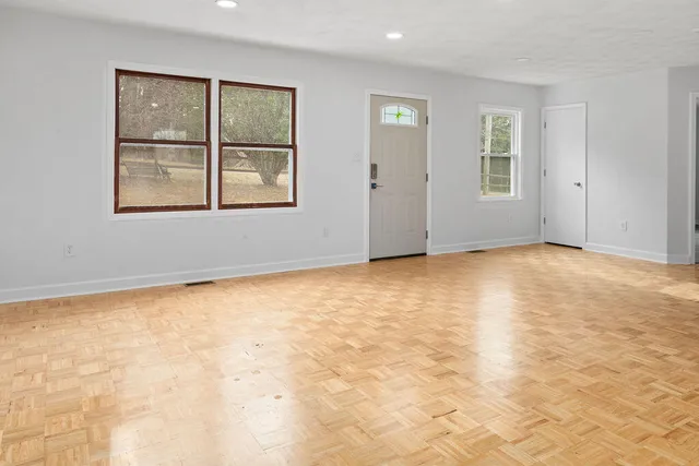 an empty room with windows