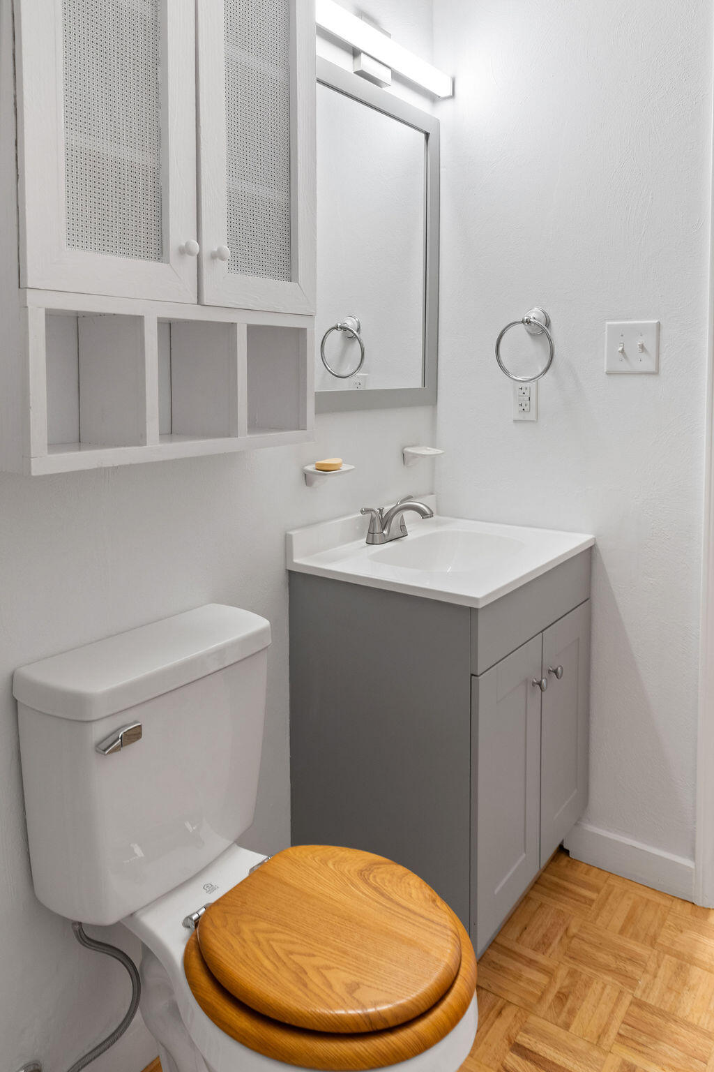 2883 Timber Ridge Buchanan, VA 24066 - Photo 8 of 39 a bathroom with a toilet sink vanity and mirror