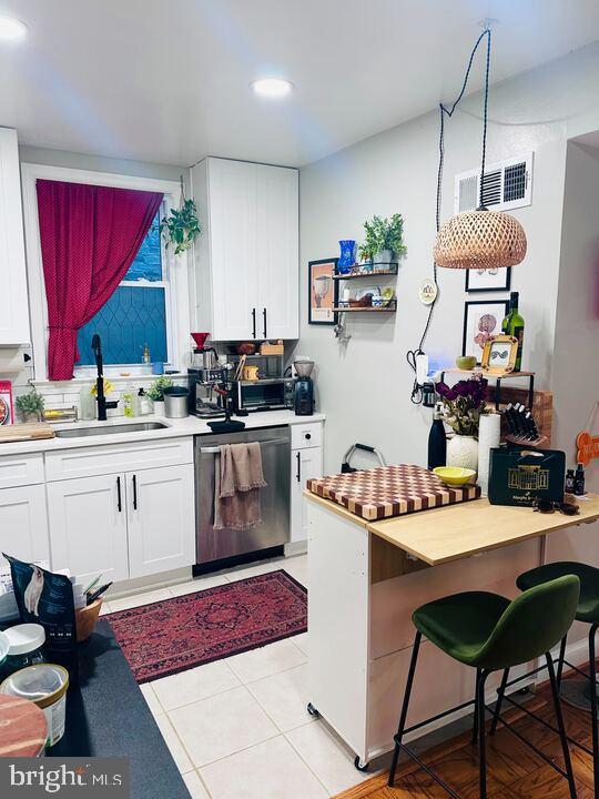 817 E Street Southeast, Unit 1 Washington, DC 20003 - Photo 17 of 25 a kitchen with a stove a table and chairs