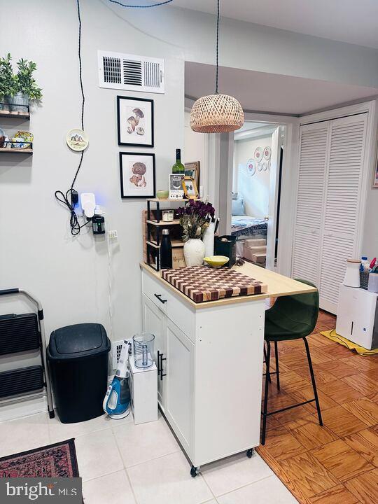817 E Street Southeast, Unit 1 Washington, DC 20003 - Photo 21 of 25 a kitchen with a table and chairs