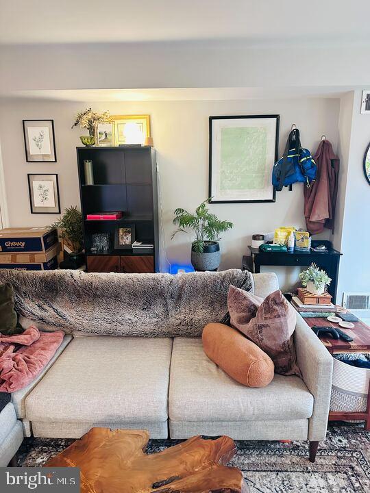 817 E Street Southeast, Unit 1 Washington, DC 20003 - Photo 6 of 25 a living room with furniture and a flat screen tv