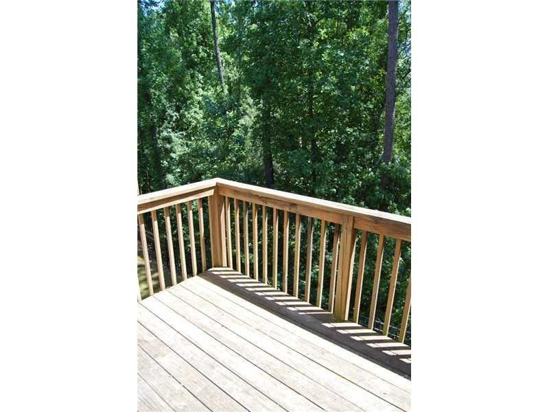 618 Providence Place Southwest Atlanta, GA 30331 - Photo 4 of 8 a view of a balcony with wooden floor