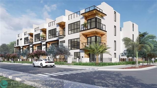 a view of a building with a street