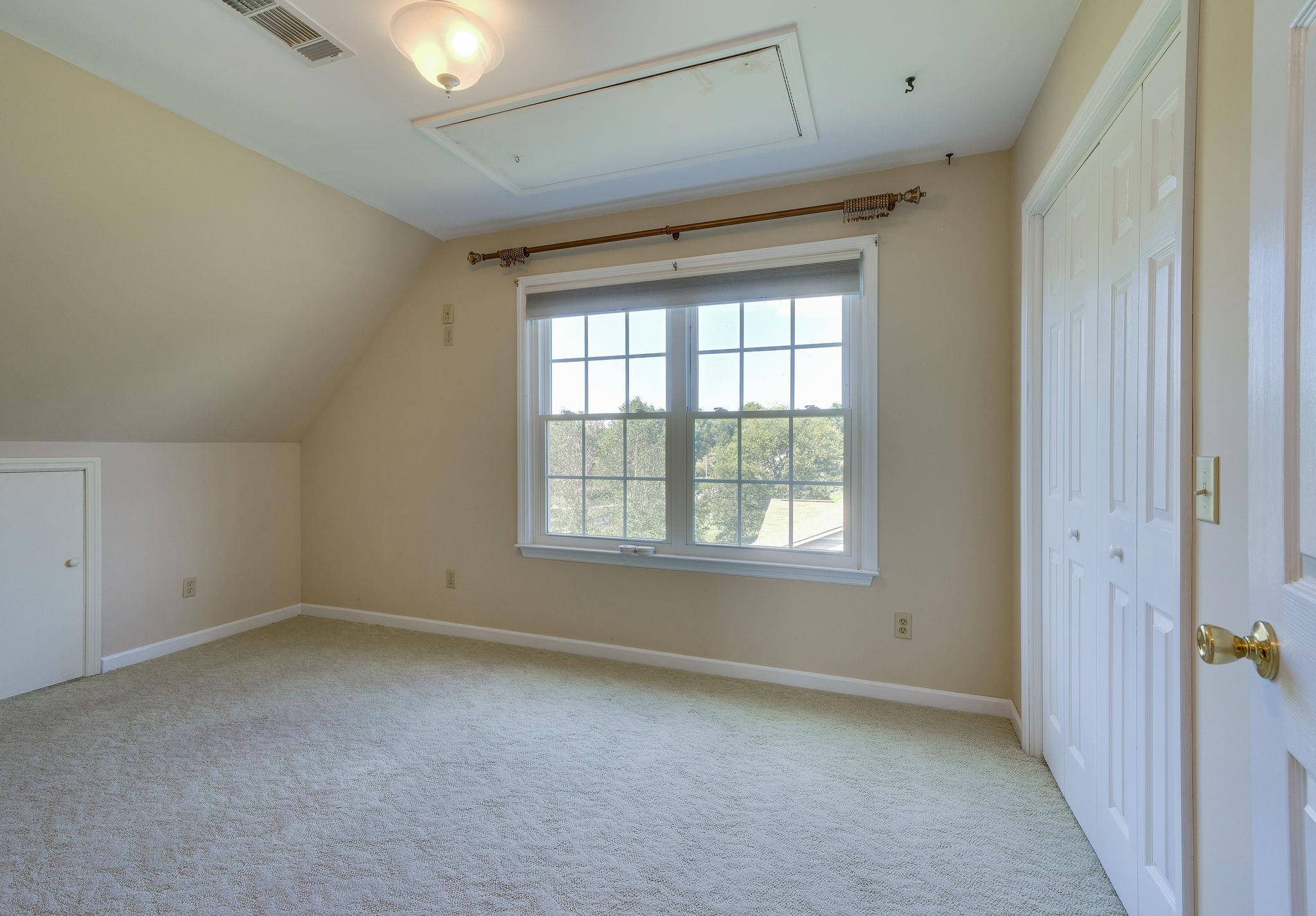 2285 Zion Road Columbia, TN 38401 - Photo 21 of 25 3rd bedroom with another walk in closet...there is so much storage in this house!