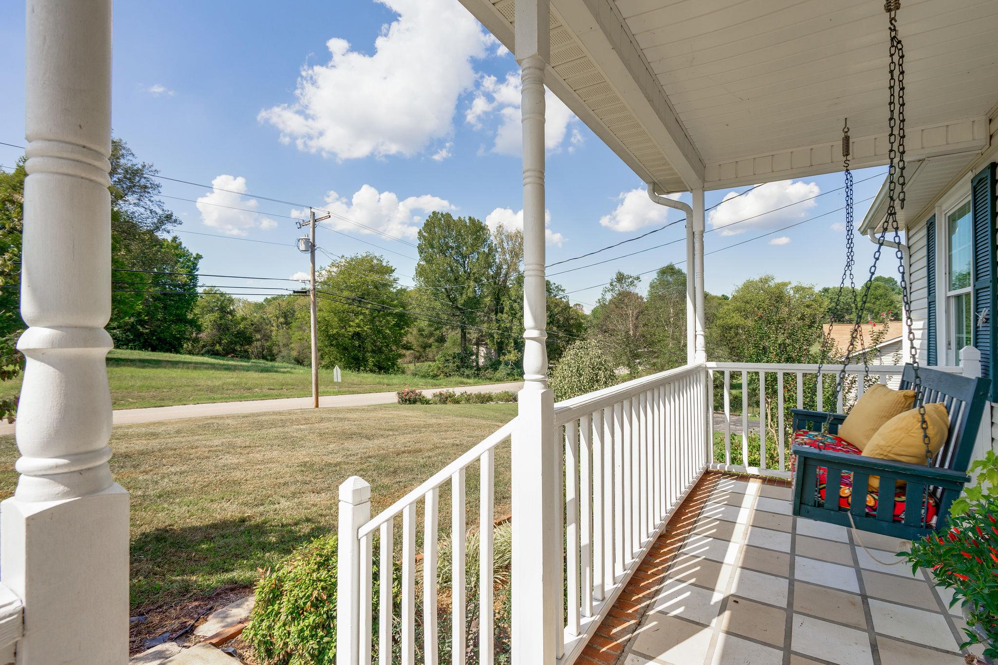 2285 Zion Road Columbia, TN 38401 - Photo 5 of 25 Imagine sitting on this front porch swing with your coffee or sweet tea!