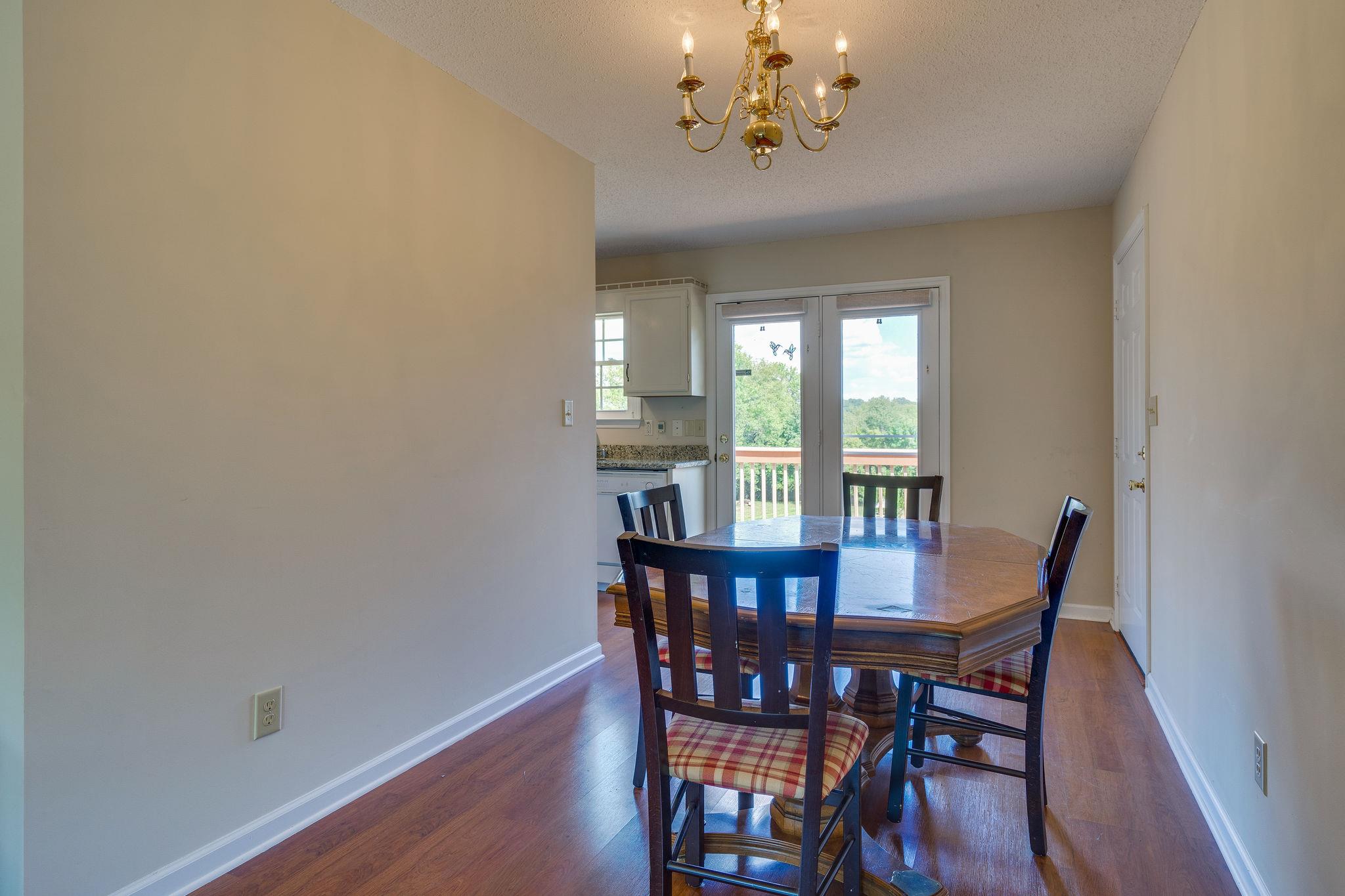 2285 Zion Road Columbia, TN 38401 - Photo 10 of 25 Enjoy your meals here in the dining room which is right off the kitchen and has pretty views.