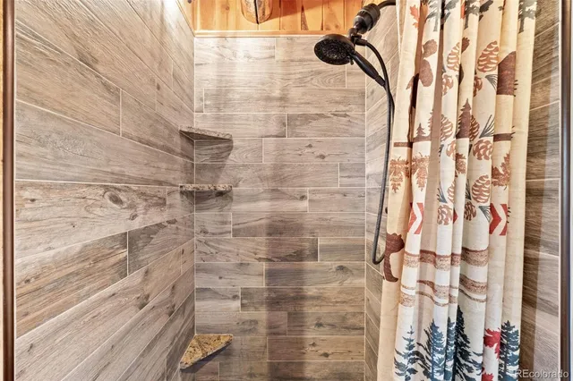 a view of an entryway with wooden floor and stairs