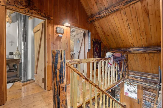 a view of a chairs and table in the patio