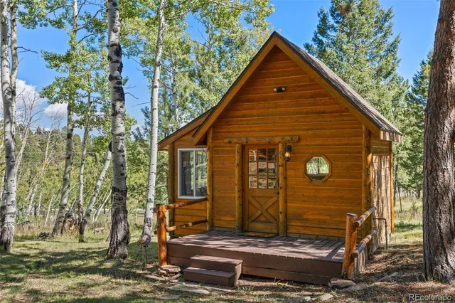 a bedroom with a bed and a table