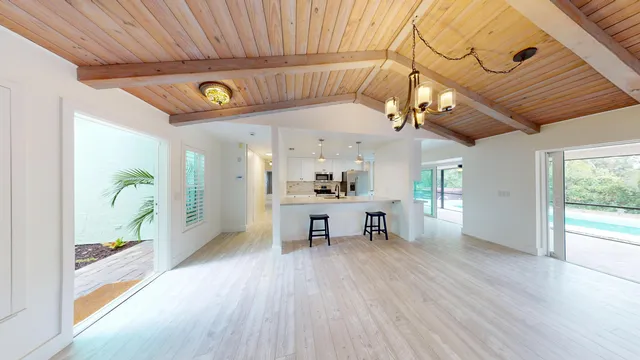 a kitchen with cabinets and stainless steel appliances