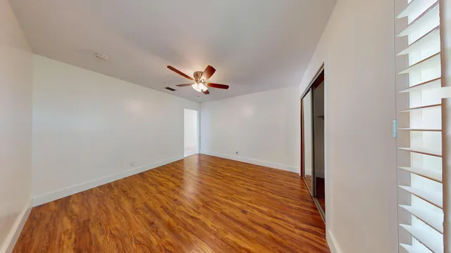 a bathroom with a bathtub shower sink and toilet