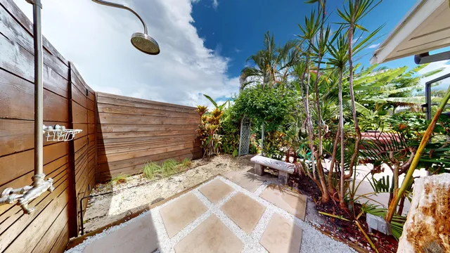 a building view with a garden space