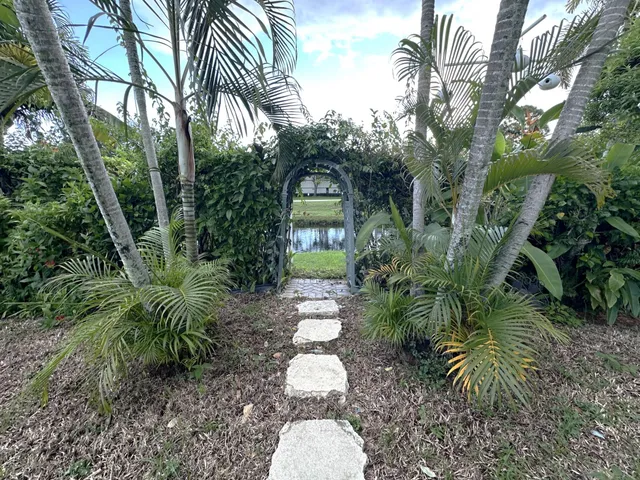 a view of a lake with a big yard