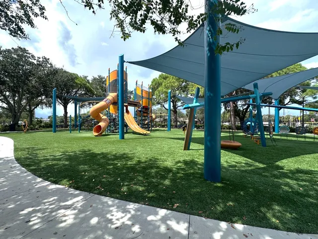 a view of a golf course with a lake