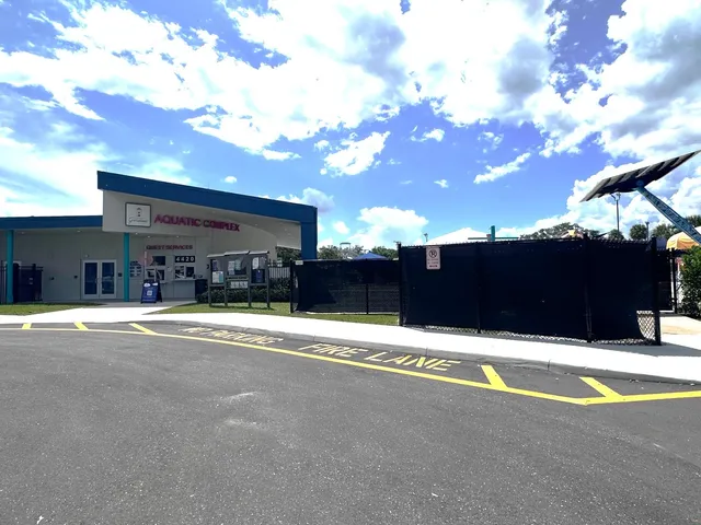 a front view of a building with street view