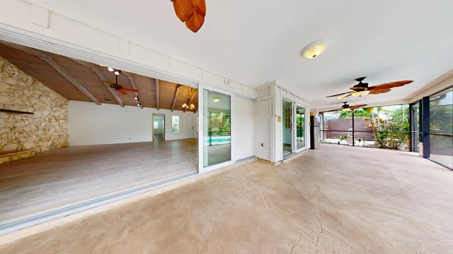 a view of a room with a sink and window