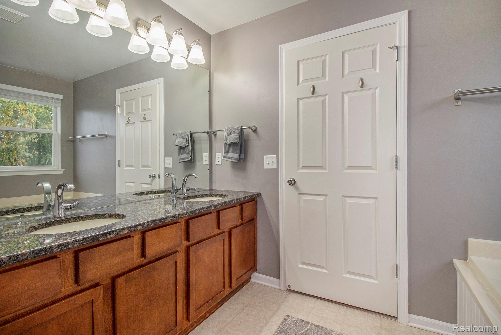 1024 Walcott Lane Howell, MI 48843 - Photo 20 of 30 Master bathroom, dual sinks!.jpg
