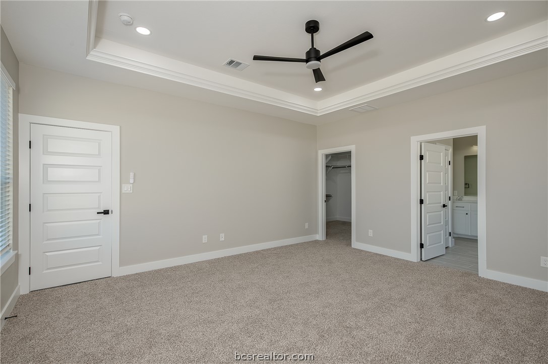 2908 GOLDBERG Drive Bryan, TX 77808 - Photo 29 of 44 a view of an empty room and a ceiling fan