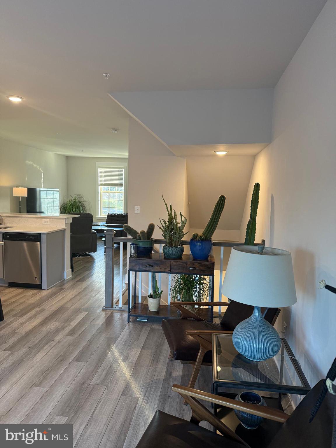 2932 Osprey Way North Frederick, MD 21701 - Photo 14 of 42 a view of a dining room with furniture and wooden floor