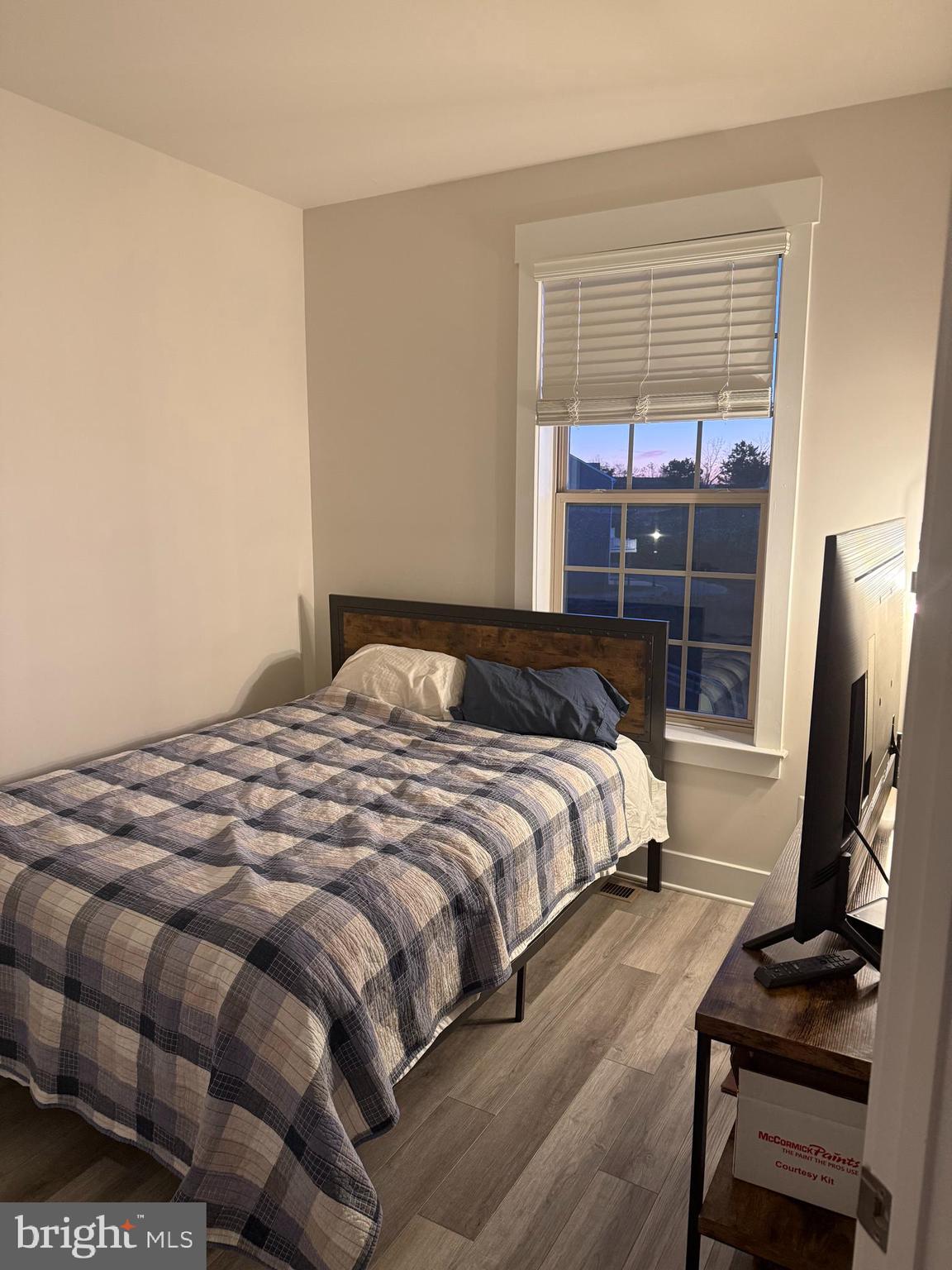 2932 Osprey Way North Frederick, MD 21701 - Photo 15 of 42 a bedroom with a bed and wooden floor